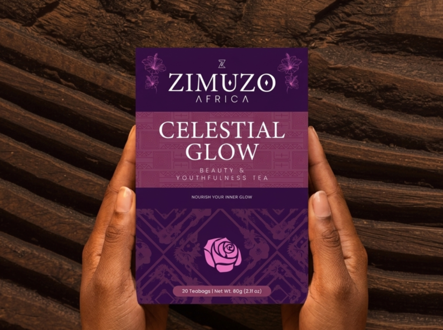 A Zimuzo Africa tea box held in hands, showing the Uli Igbo art motifs on the packaging.
